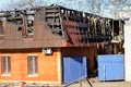 Damage to the roof from the fire. Brick house, damaged by fire. Fire safety