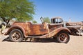 Damaged abandoned car at the service station Solitaire, Namibia Royalty Free Stock Photo