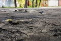 Damaged asphalt pavement road with potholes Royalty Free Stock Photo