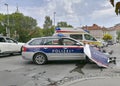 Damaged Austrian federal police vehicle after car accident on the road, in Graz, Austria