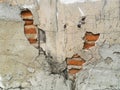 Damaged brick walls cracked