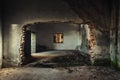 Damaged building interior with large hole