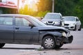 Damaged in car accident vehicle on city street crash site Royalty Free Stock Photo