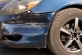 Damaged car.  Broken front bumper. The concept of road safety. Close up Royalty Free Stock Photo