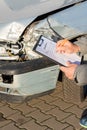 Damaged car and damage assessment by an expert