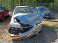 Damaged car in scrap yard