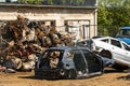 Damaged cars in a wreckyard