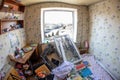 Damaged children`s bedroom in the apartment of one of the houses as a result of explosions and shelling by the Russian occupation