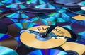 Damaged compact disc. Secure backup and disposal of digital personal data Royalty Free Stock Photo
