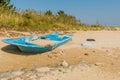 Damaged flat bottom boat filled with sand Royalty Free Stock Photo