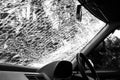 Damaged glass (car windshield) inside car Royalty Free Stock Photo