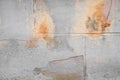 Damaged grey wall with orange paint splash texture background. Creative backdrop. Old building interior fragment Royalty Free Stock Photo