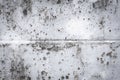Damaged grey and white wall with holes texture background. Creative backdrop. Old, abandoned building interior fragment