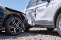 Damaged in heavy car accident vehicles after collision on city street crash site. Road safety and insurance concept Royalty Free Stock Photo