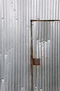 Damaged metal door Royalty Free Stock Photo