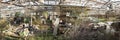 Damaged and neglected agriculture greenhouse with plenty of mess and chopped overgrown rose bushes. Missing and broken glass Royalty Free Stock Photo