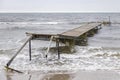 Damaged pier after flood storm in Ishoj Denmark 20 October 2023 Koge bugt,