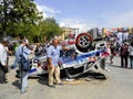 Damaged police car and memories people photographer. Royalty Free Stock Photo