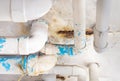 Damaged PVC Water pipe leak , building drainage pipes crack seep problem need to fix Royalty Free Stock Photo