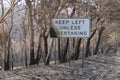 Damaged road sign in the bushfires in The Blue Mountains in Australia Royalty Free Stock Photo