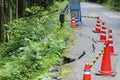 Damaged road with warning signs Royalty Free Stock Photo