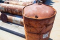 Damaged and rusty steel drum close up