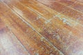 Damaged seasoned wooden floor plank with scratch marks needs res