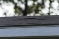 Damaged shingle on roof Royalty Free Stock Photo