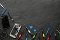 Damaged smartphone and repair tools on black background, flat lay. Space for text Royalty Free Stock Photo