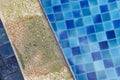 Damaged swimming pool edge from acid swimmint pool water Royalty Free Stock Photo