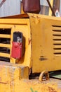 Damaged taillight of a old forklift truck closeup Royalty Free Stock Photo