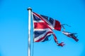 Damaged Union Jack Flag symbol of the disharmony within UK over Brexit