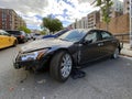 Damaged vehicle parked and awaiting removal Bronx NY