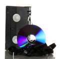 Damaged videotape with dvd Royalty Free Stock Photo
