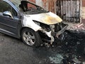 Damaged windshield and front of the car that burned in an accident Royalty Free Stock Photo