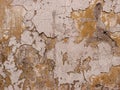 Damaged yellow painted wall texture