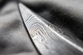 Damascus blade edge on microfiber Royalty Free Stock Photo