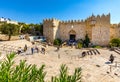 Damascus Gate of ancient Old City walls leading to bazaar marketplace of Muslim Quarter of Jerusalem in Israel Royalty Free Stock Photo