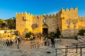 Damascus Gate of ancient Old City walls leading to bazaar marketplace of Muslim Quarter of Jerusalem in Israel Royalty Free Stock Photo