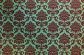 Damask repeat pattern on old paper. Royalty Free Stock Photo