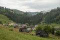 Dambovicioara village surrounded by forests,Romania Royalty Free Stock Photo