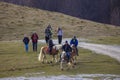 Dambovita Runcu October 19, 2021, tourists relaxing on horseback in the Leaota Mountains Royalty Free Stock Photo