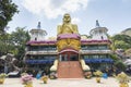 Dambulla Sri Lanka: 03/16/2019: The Golden Temple main facade of the Buddhist Museum showing the approach to the visitor entrance