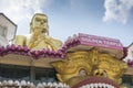 Dambulla, Sri Lanka : 03/16/2019: The Golden Temple showing a closeup of the Buddha statue and the name of the world heritage