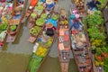 Damnoen Saduak Floating Market or Amphawa. Local people sell fruits, traditional food on boats in canal, Ratchaburi District, Royalty Free Stock Photo