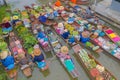 Damnoen Saduak Floating Market or Amphawa. Local people sell fruits, traditional food on boats in canal, Ratchaburi District, Royalty Free Stock Photo