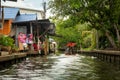 Damnoen Saduak Floating Market, tourists visiting by boat, located in Bangkok, Thailand Royalty Free Stock Photo