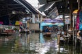 Damnoen Saduak Floating Market, tourists visiting by boat, located in Bangkok, Thailand Royalty Free Stock Photo