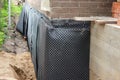 Damp proofing. House basement,foundation insulation details with waterproofing and Damp Proof membranes, trench with sand