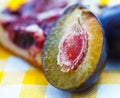 Damson plums and cake Royalty Free Stock Photo